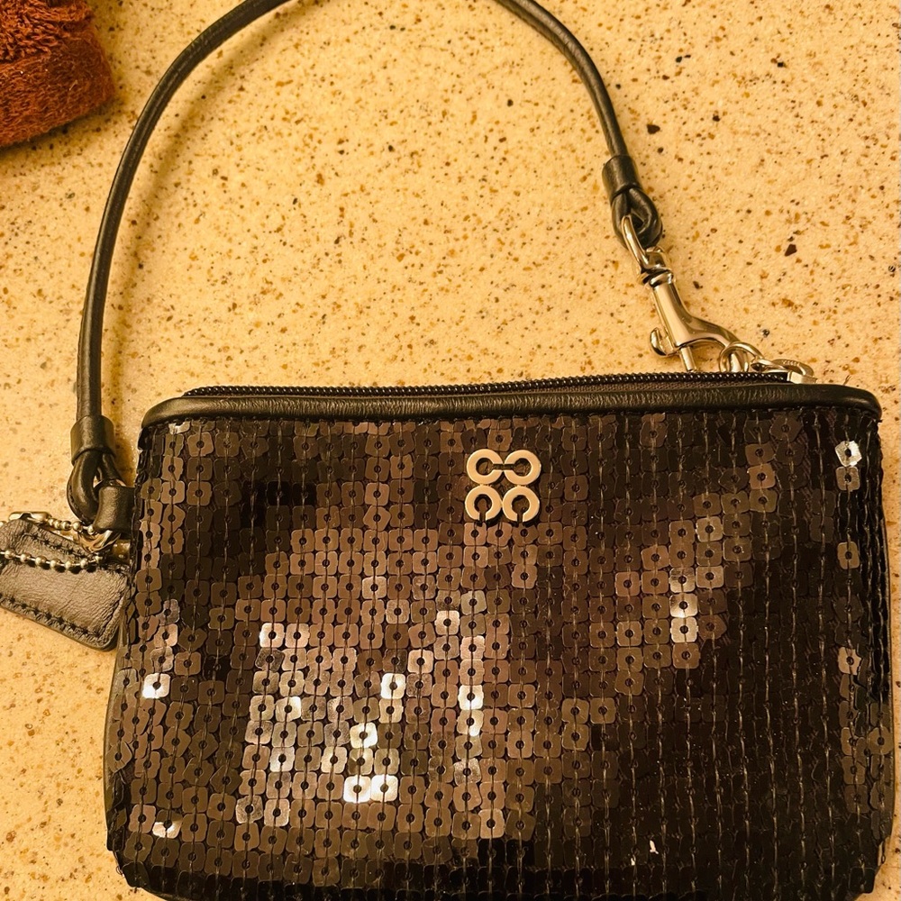 Coach wristlet . Black